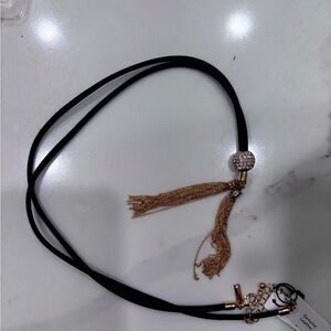 Gorgeous sparkly lariat necklace with genuine, leather crystals, and tassels